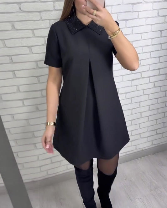 Elegantní dámské šaty se stojáčkem