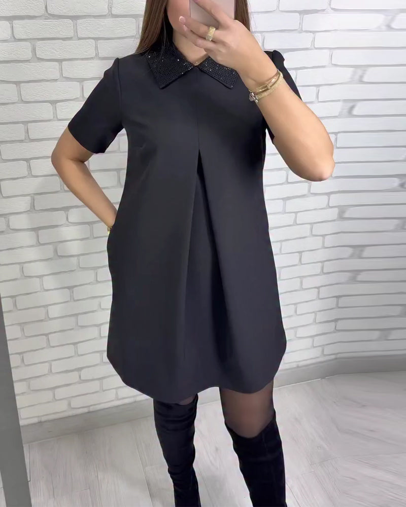 Elegantní dámské šaty se stojáčkem