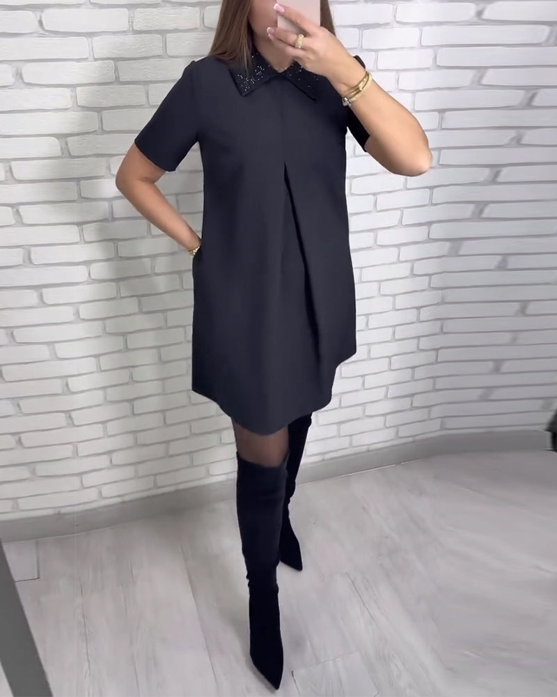 Elegantní dámské šaty se stojáčkem