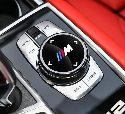Dekorativní nálepka na knoflík multimediálního systému BMW