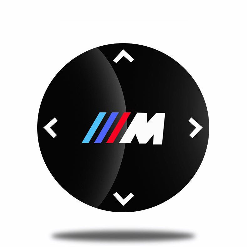 Dekorativní nálepka na knoflík multimediálního systému BMW